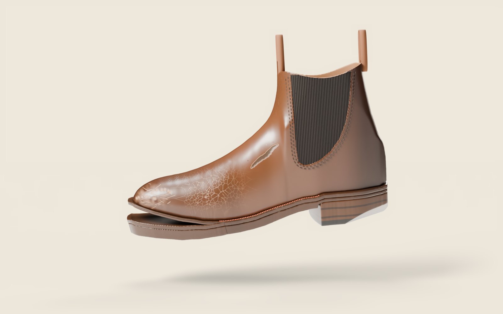Before: a worn Chelsea boot with a chewed toe, a sole coming away, a torn side and a worn heel